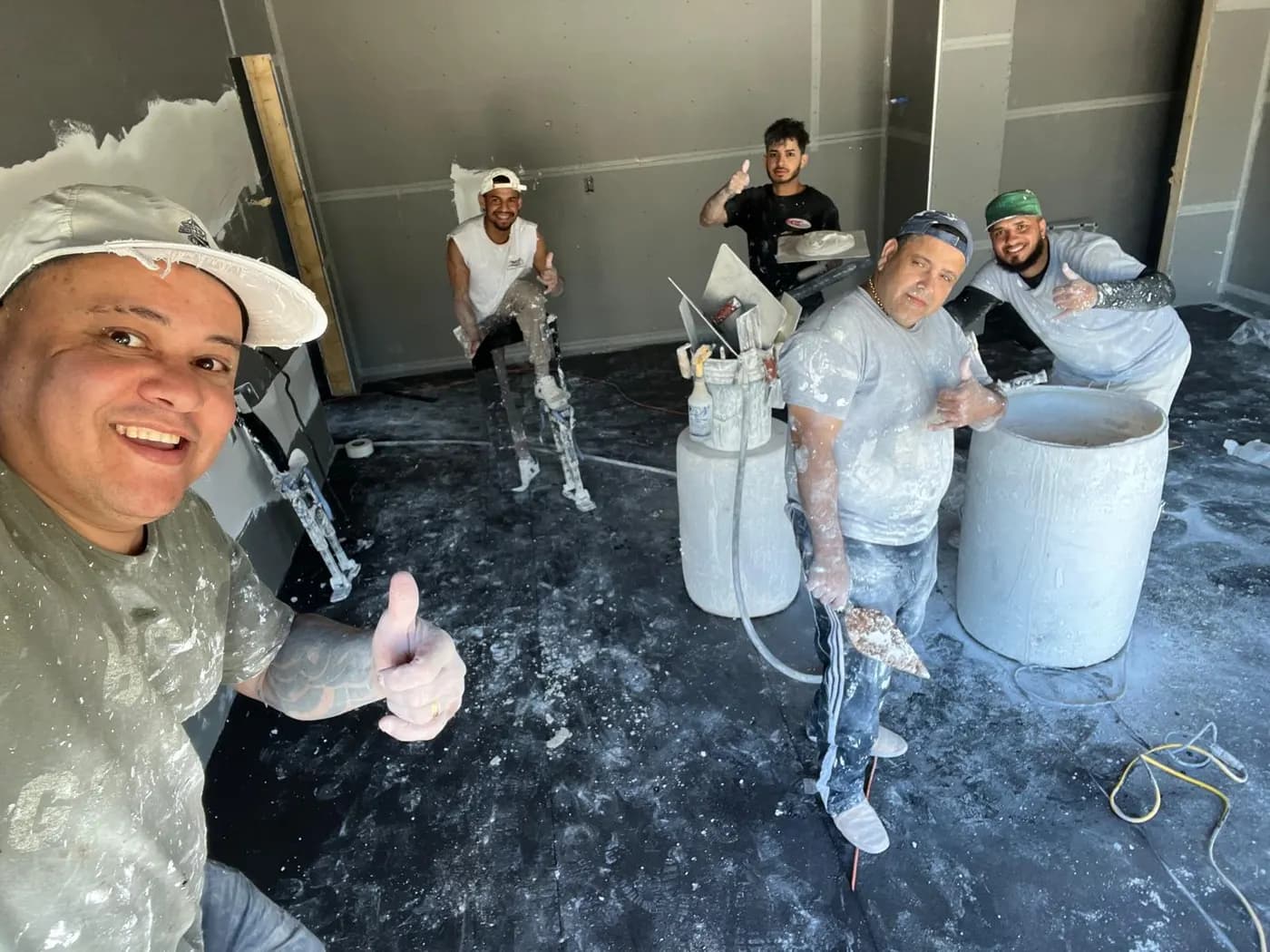 The L&A Plastering crew on a job site in Greater Boston